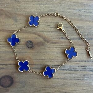 Elegant Gold and Blue Charm Bracelet